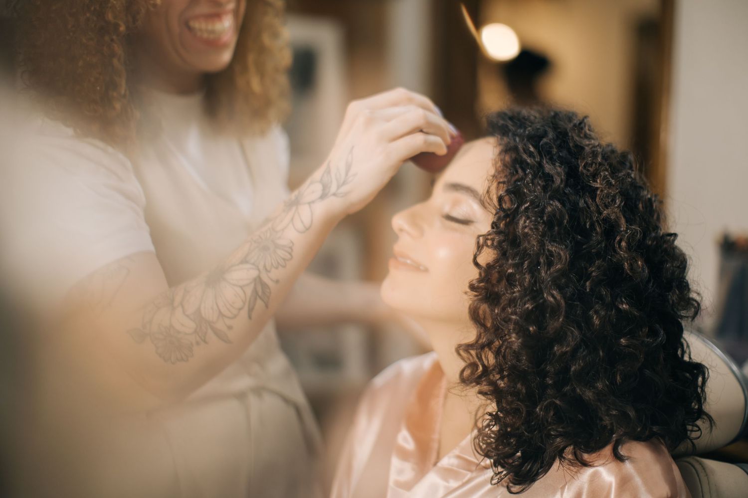 Wedding preparation scene with elegant salon decor and styling details.