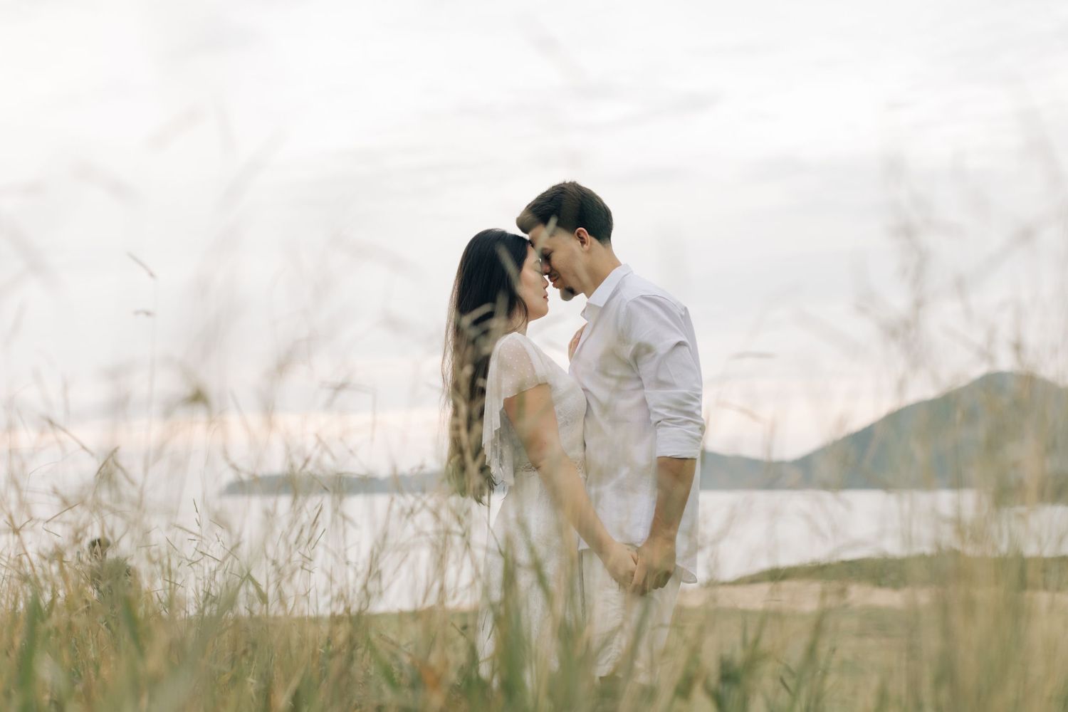 Romantic couple photography session in outdoor natural setting.