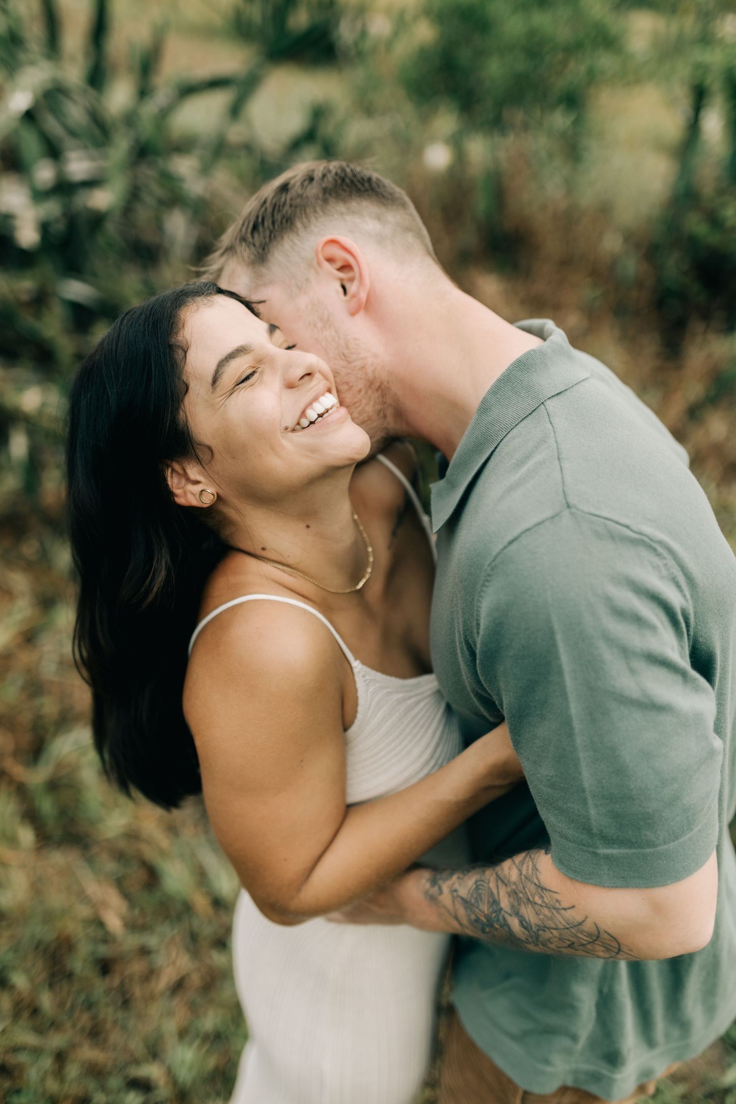 Natural candid moments between a couple are captured in a series of intimate photographs.