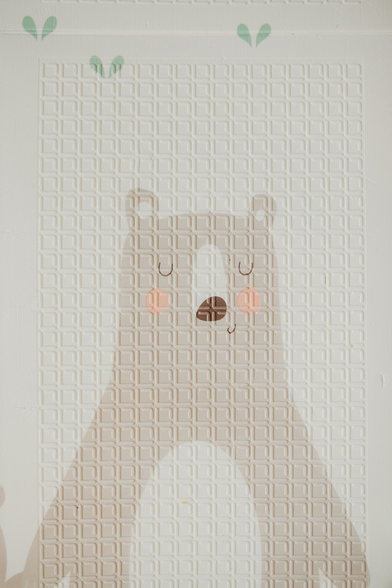 Simple line drawings of a cute bear character progressing through different expressions on white paper.