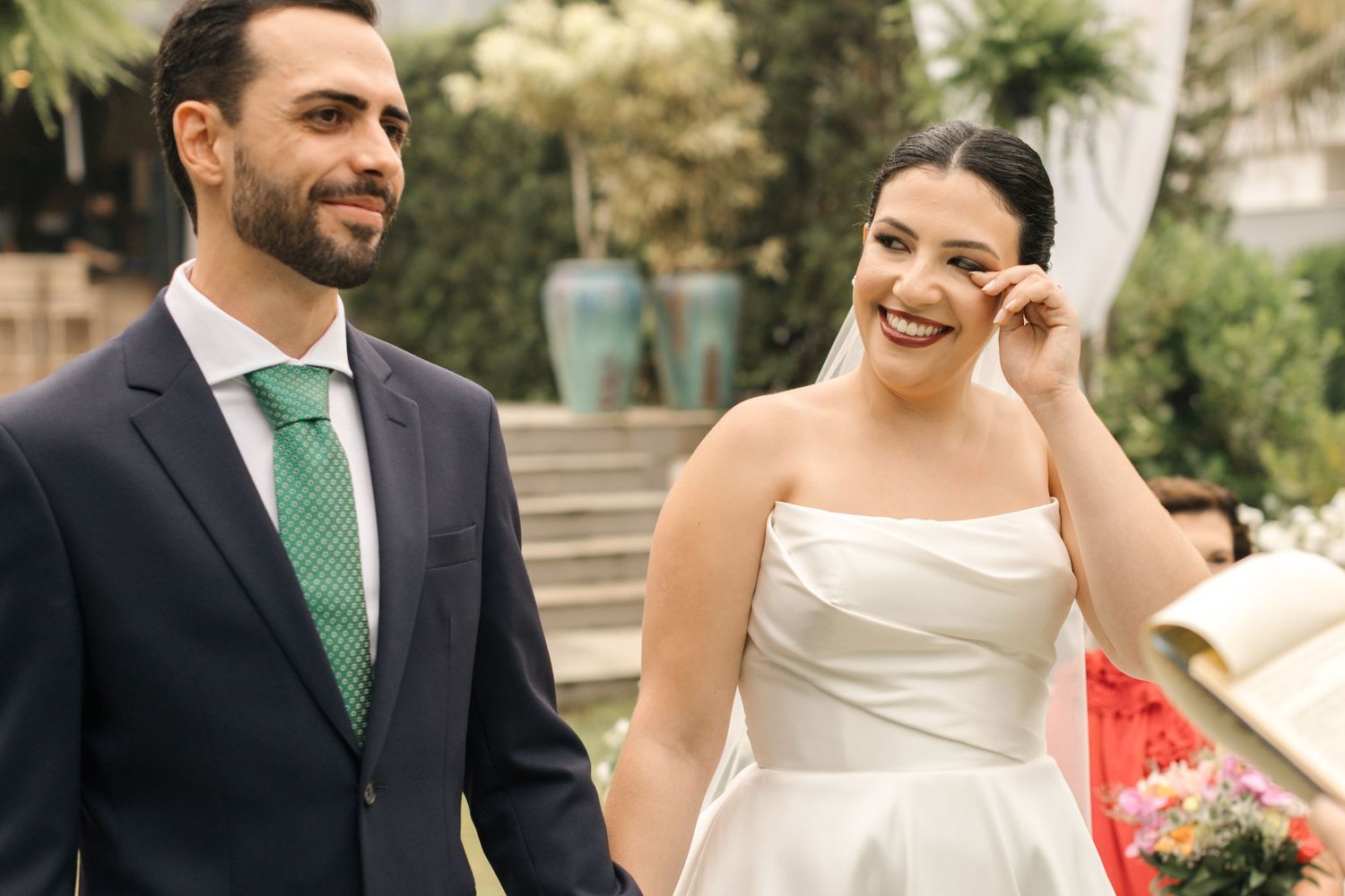 Joyful wedding celebration moments captured in an outdoor garden setting.