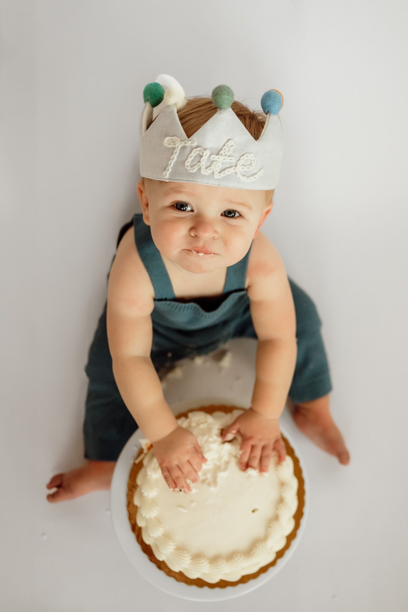 One year old smashing birthday cake, cake smash photography, Philadelphia area