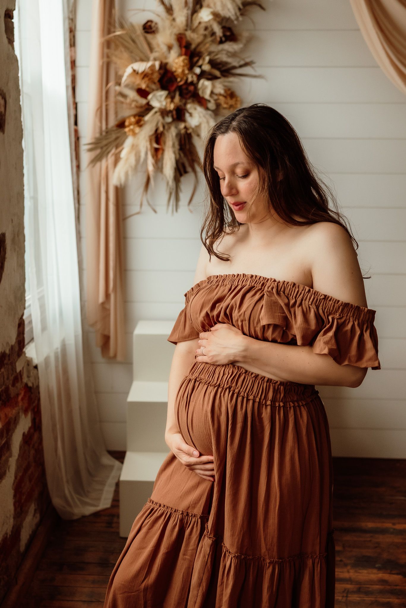 Close up of baby bump with hands, maternity photography near Philadelphia PA