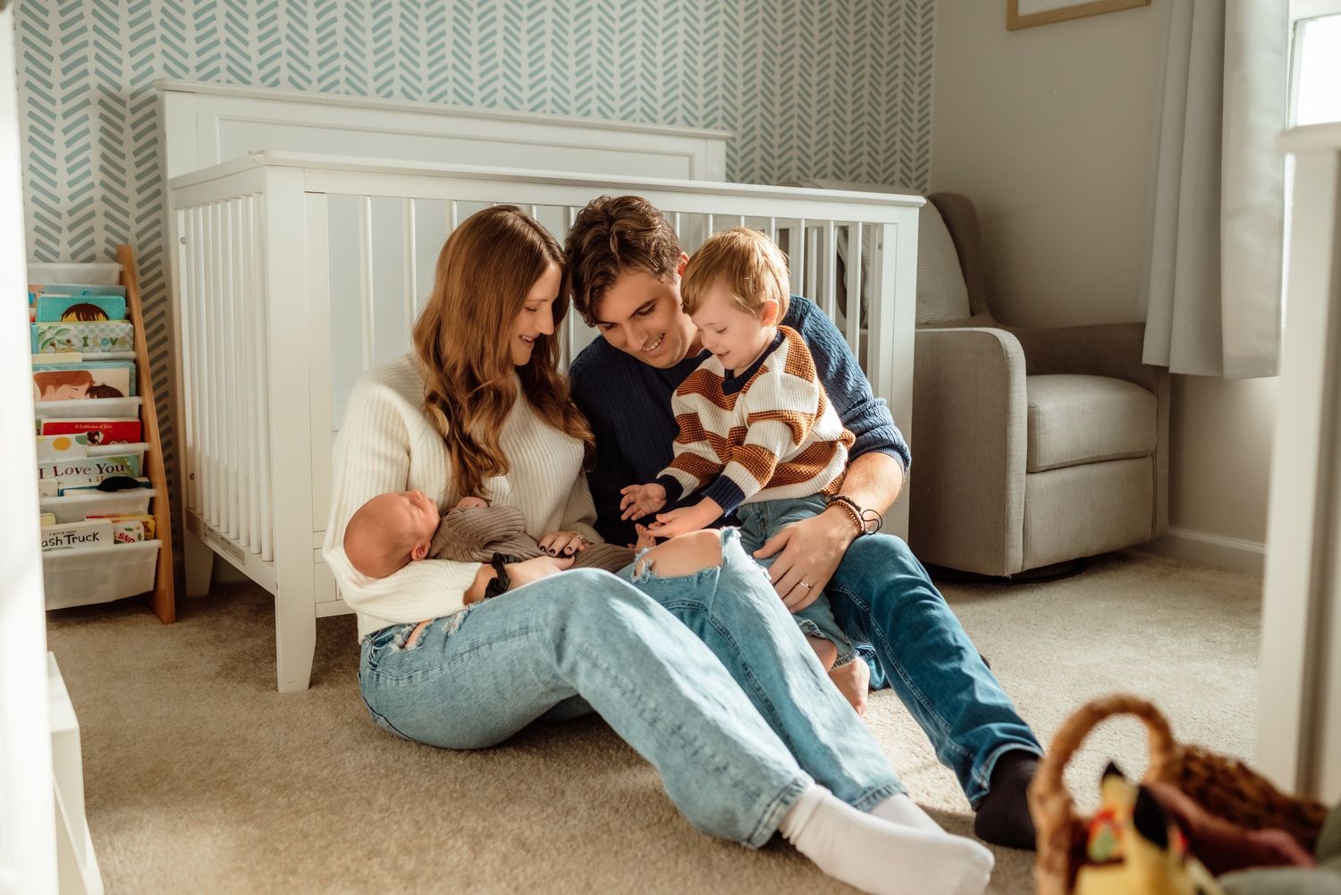 Siblings meeting newborn baby for first time, lifestyle in-home session, Phoenixville, PA