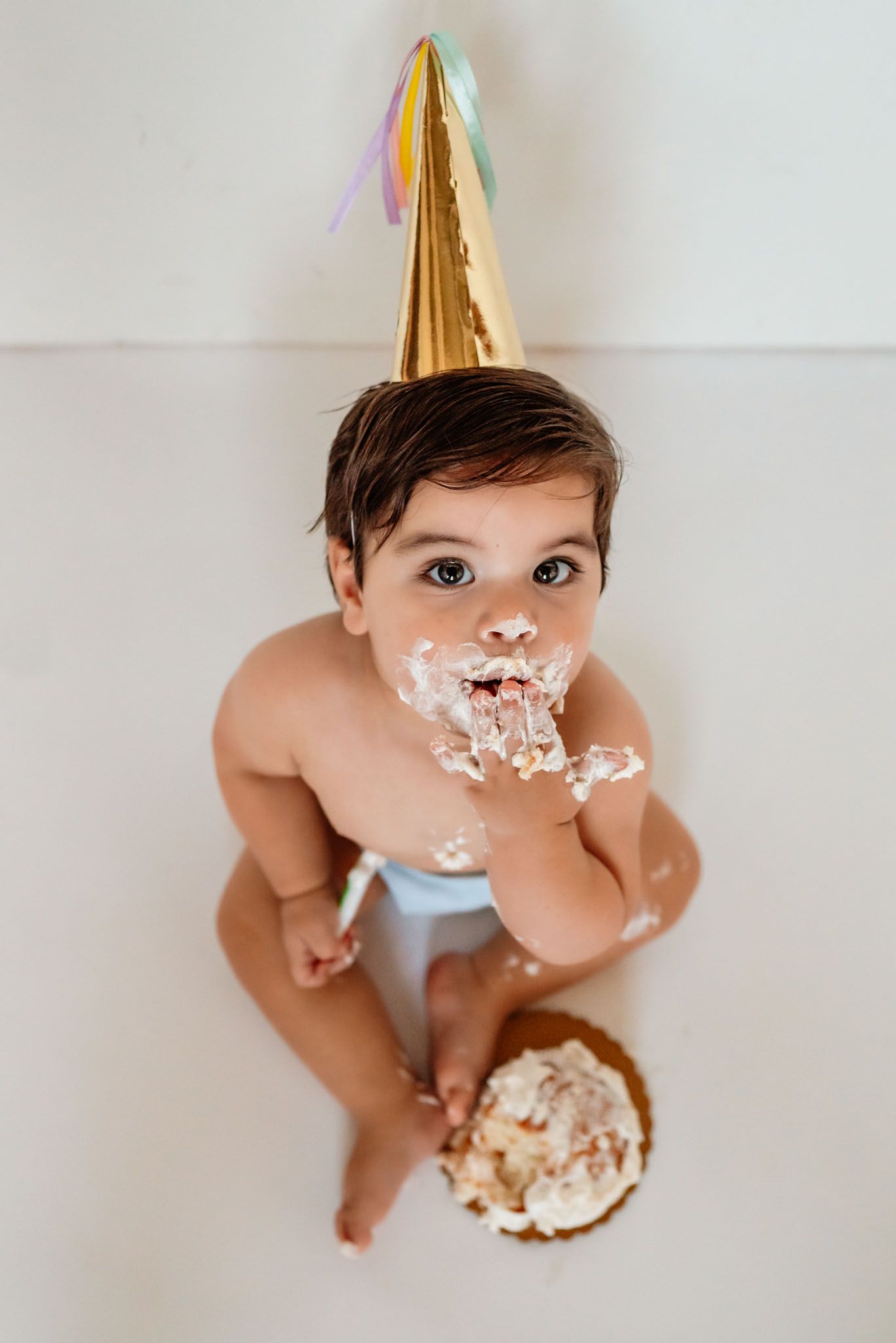 One year old smashing birthday cake, cake smash photography, Philadelphia area