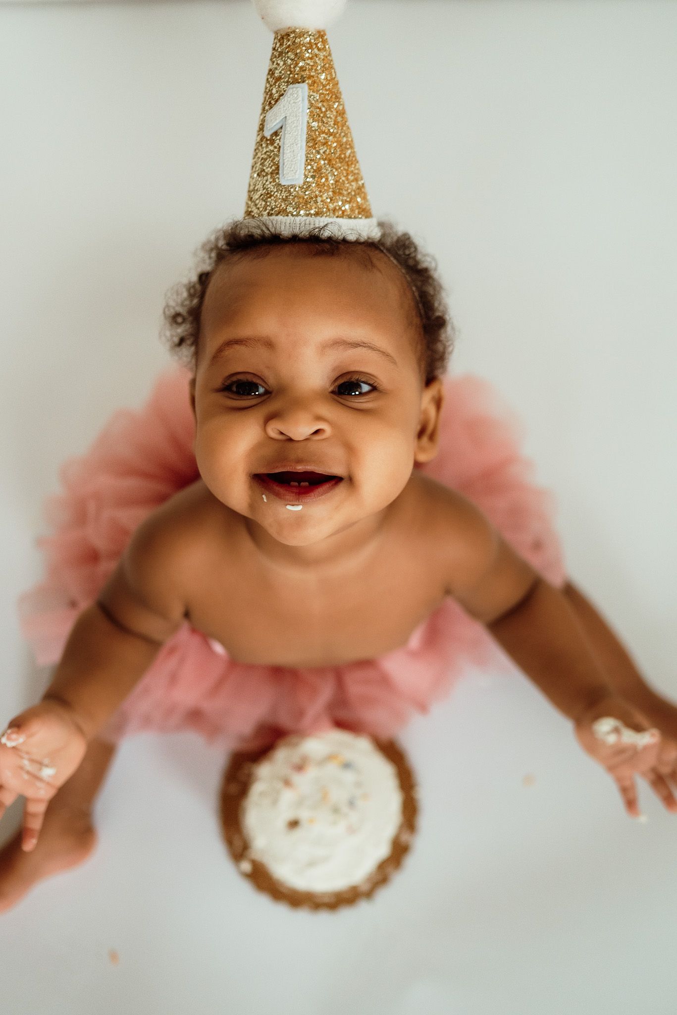 One year old smashing birthday cake, cake smash photography, Philadelphia area