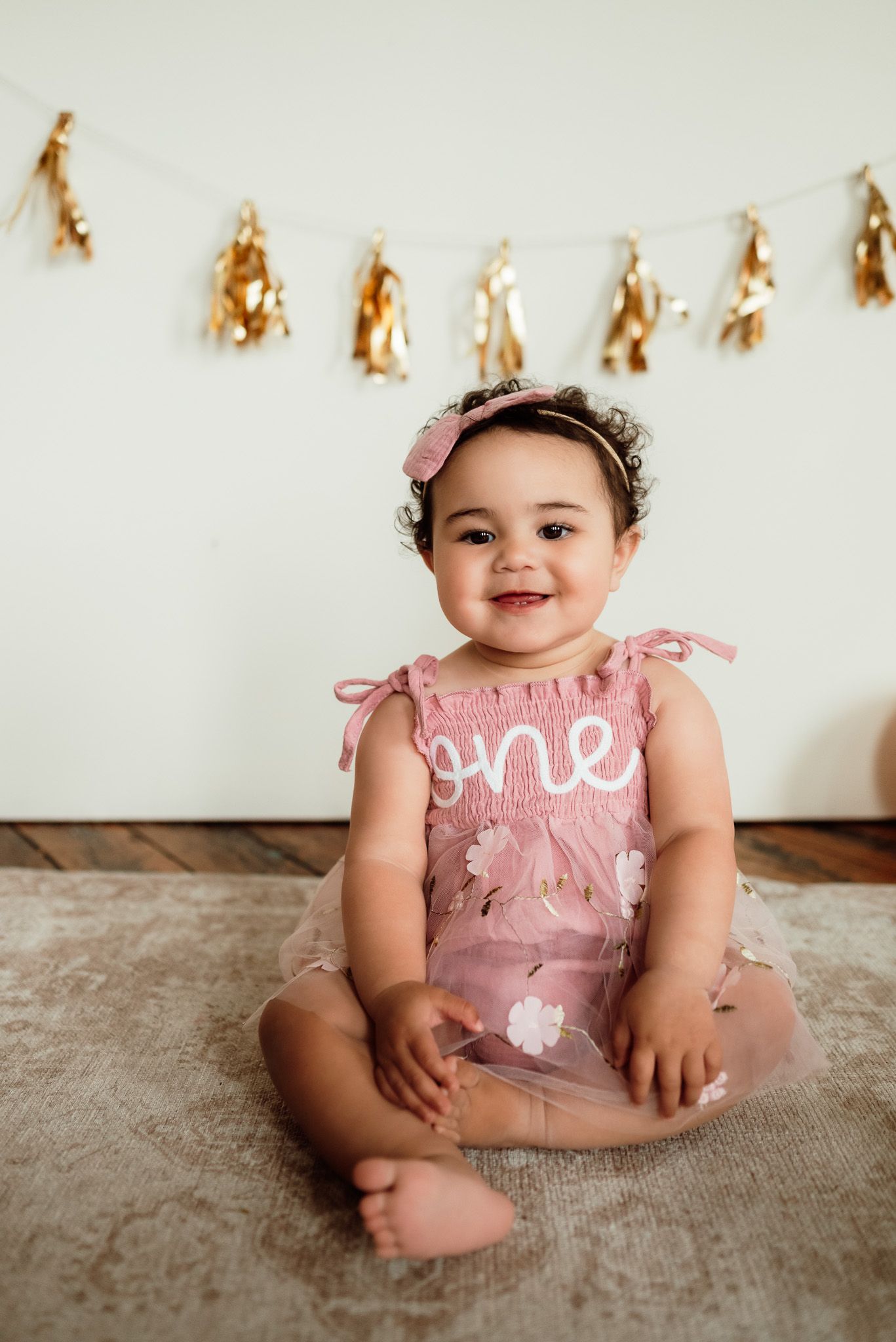 Baby girl in pink tutu during cake smash session, Collegeville PA milestone photographer