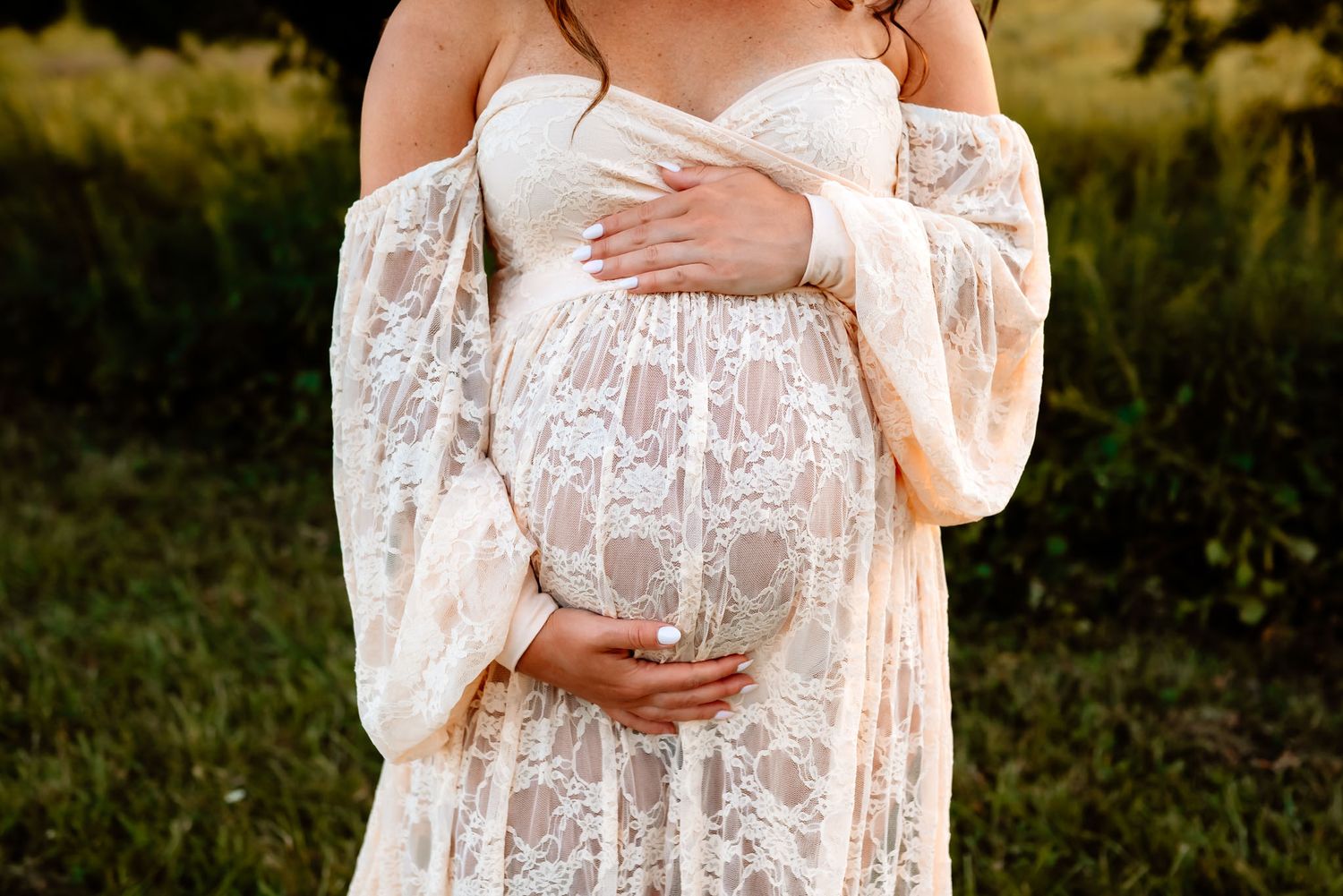 Close up of baby bump with hands, maternity photography near Philadelphia PA
