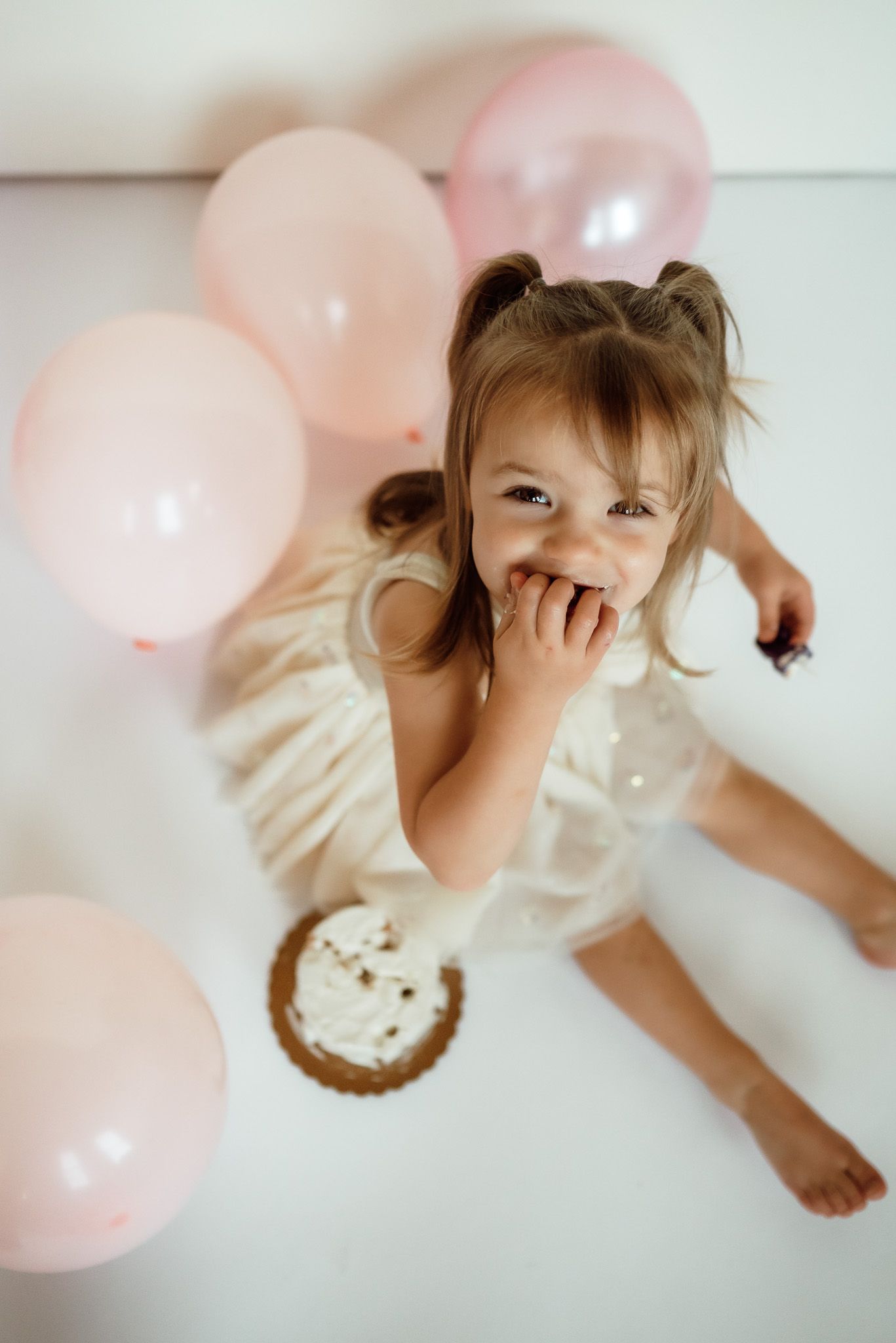 Toddler standing and laughing, milestone portrait session near Philadelphia