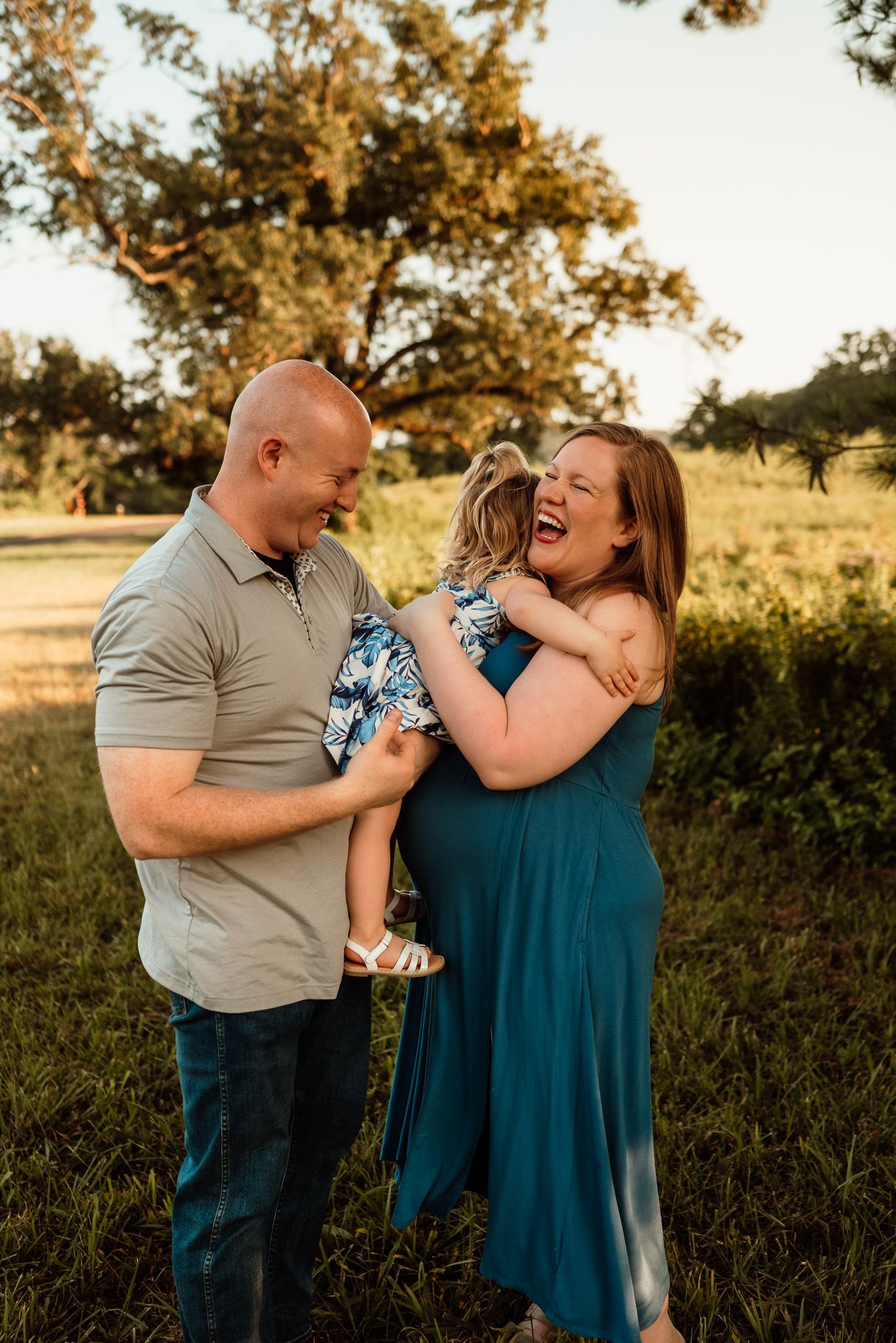 Pregnant mom with toddler kissing her belly, family maternity session, Montgomery County PA