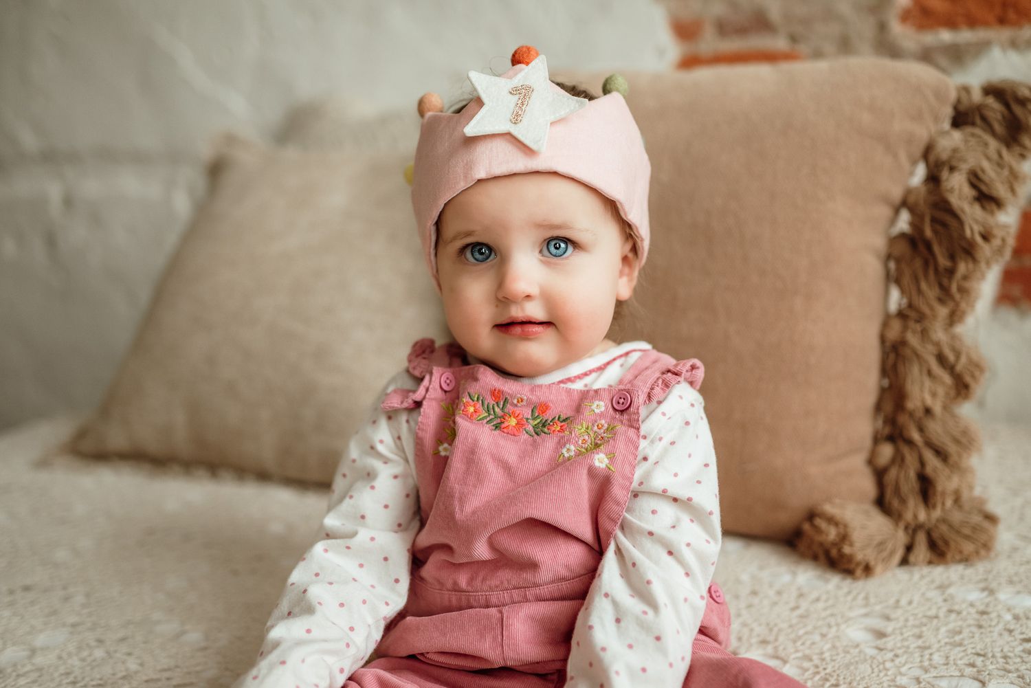 Baby sitting up in white onesie, sitter milestone session, Collegeville PA