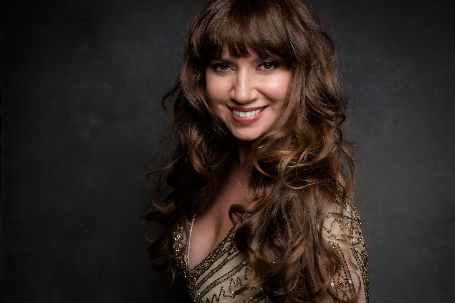 Professional studio portraits with soft lighting and natural expressions.