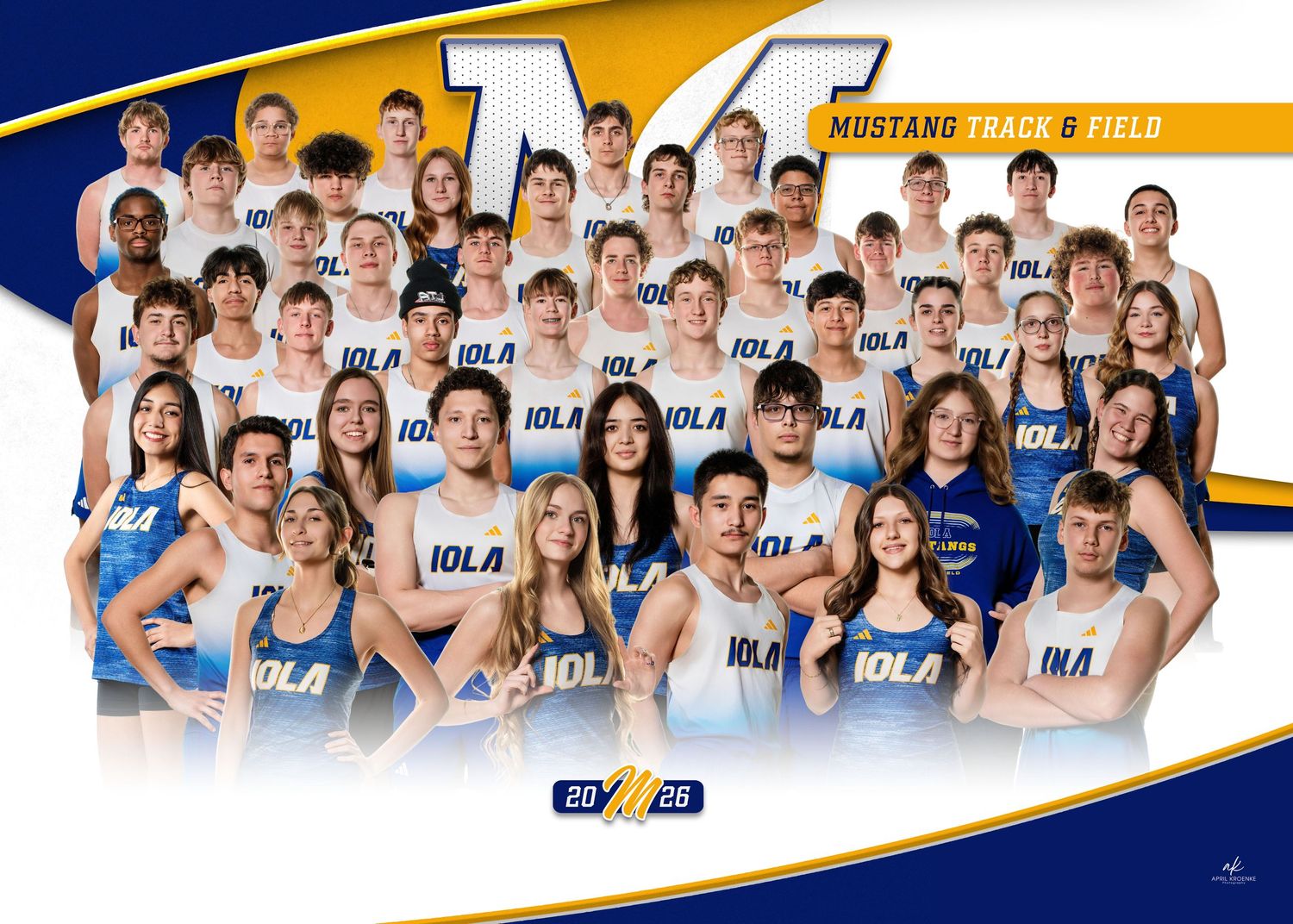 Group photo of UCLA swim team members posing together in blue team uniforms and swimwear.