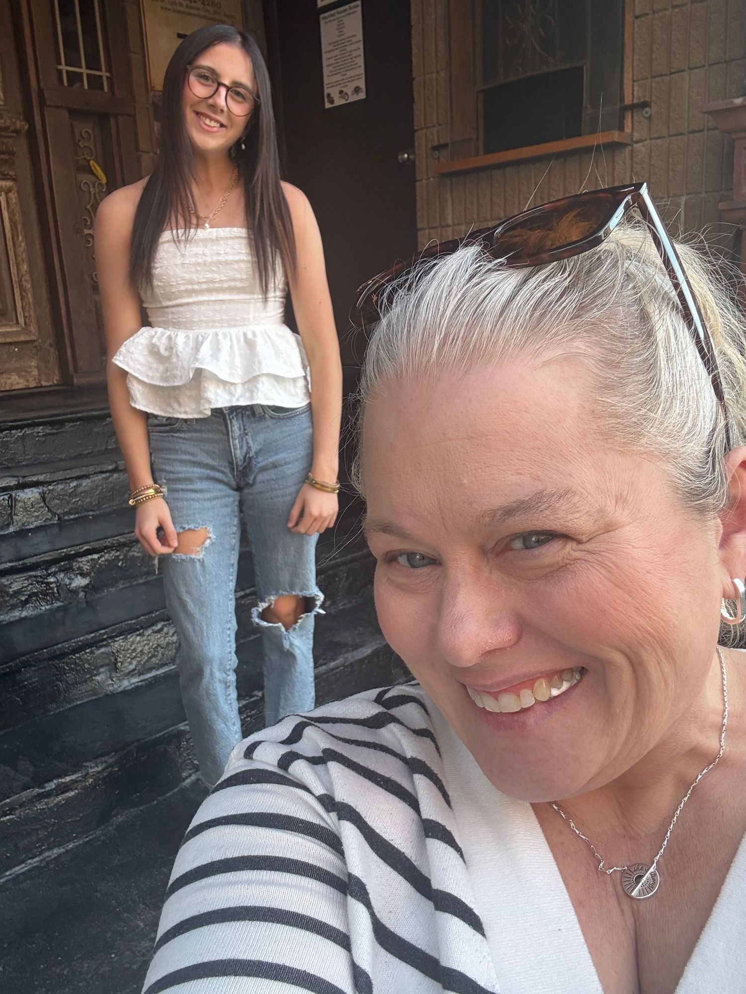 A casual photo series showing someone wearing glasses and a striped shirt in a rustic wooden setting.