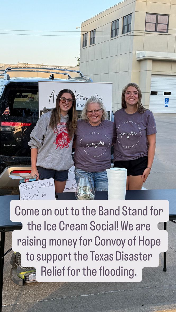 Group wearing matching t-shirts hosting an ice cream social fundraiser for Texas Disaster Relief and Convoy of Hope.