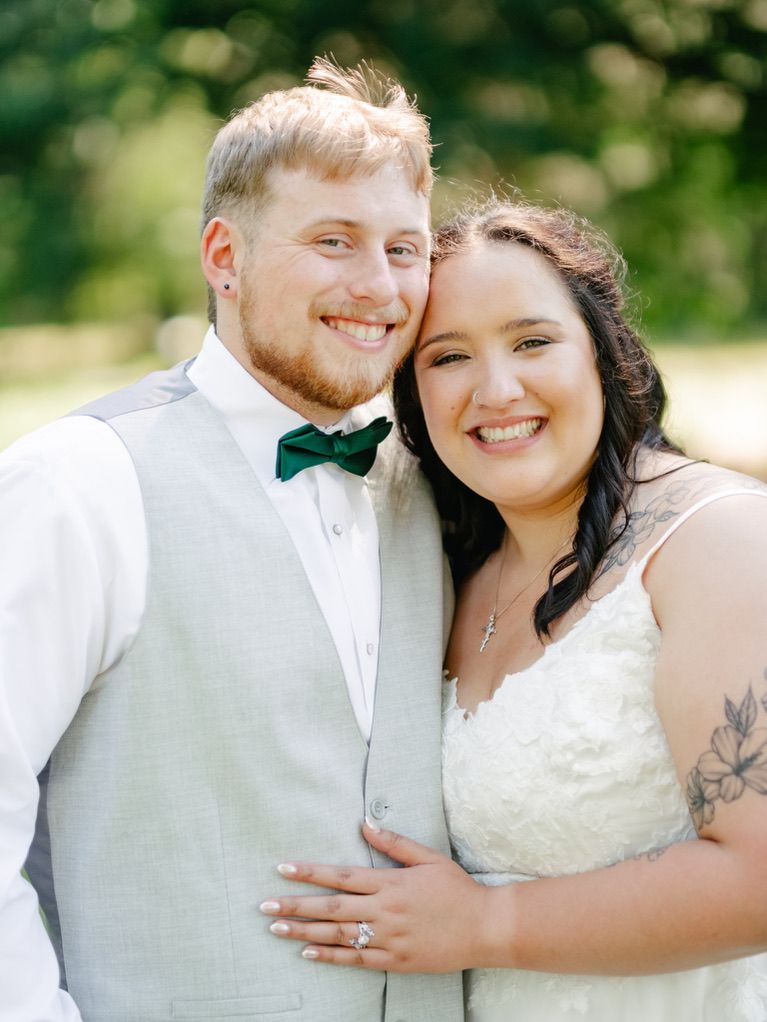 A happy couple in wedding attire share joyful moments together outdoors in a series of candid photographs.