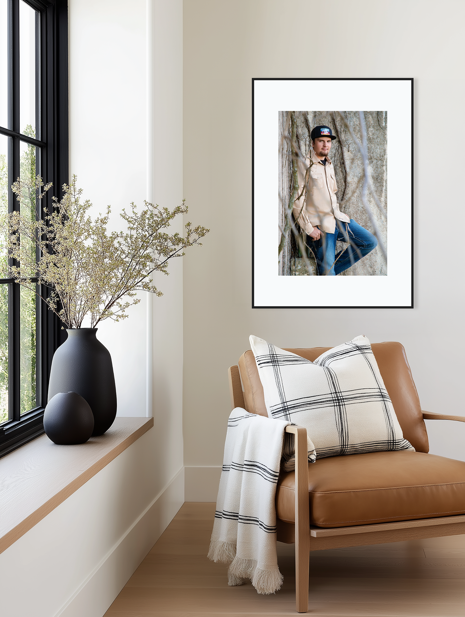 A series of minimalist interior photos showing a brown leather chair, white throw blanket, and black vase with dried flowers.