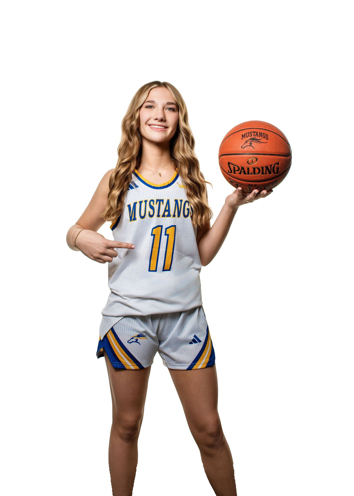 Basketball player in white Mustangs jersey number 11 poses with ball in multiple action shots.