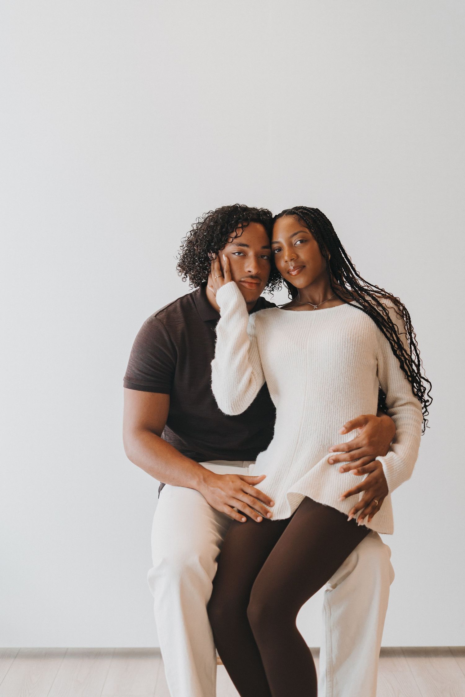 Couple posing together during a studio portrait session