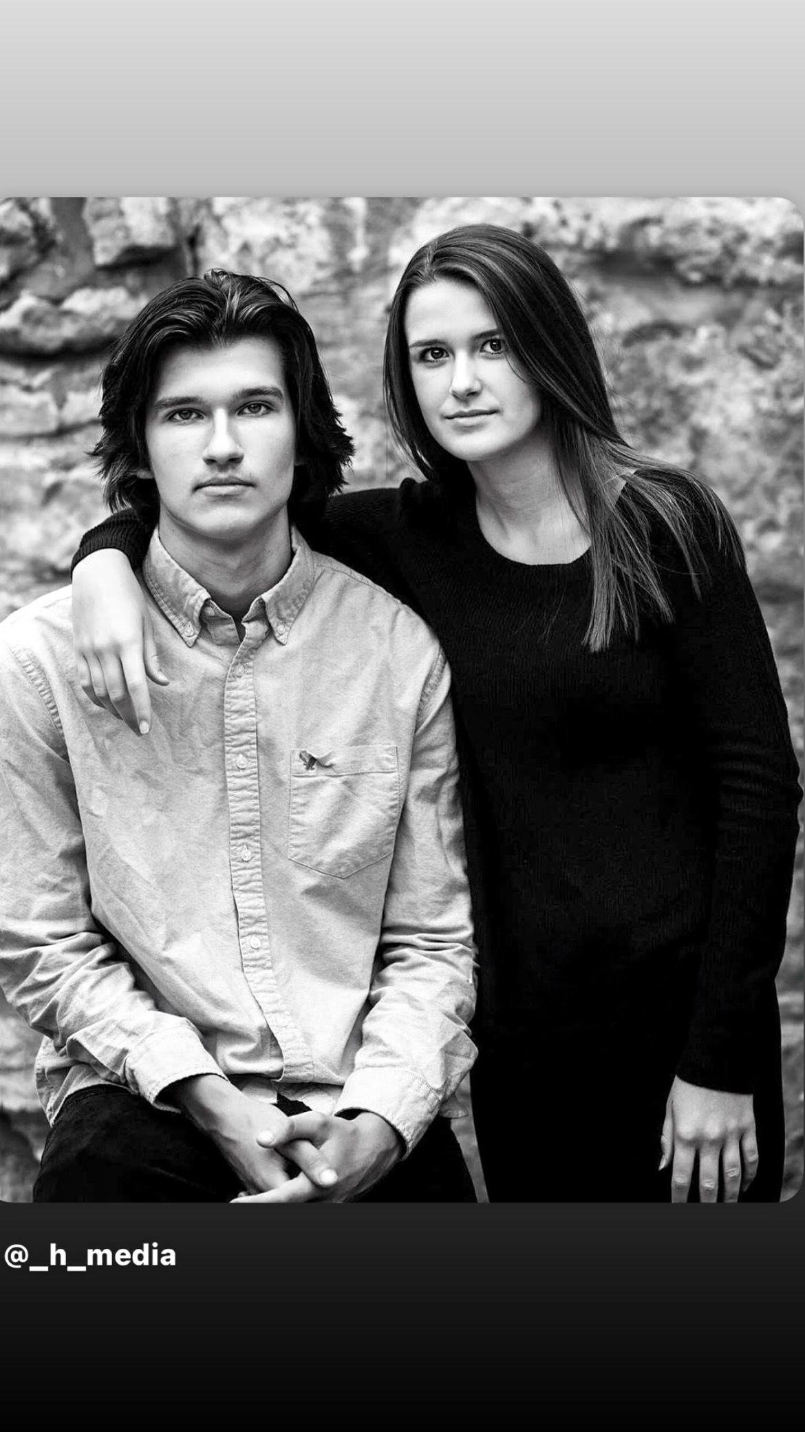Black and white portrait of siblings photographed during an outdoor portrait session