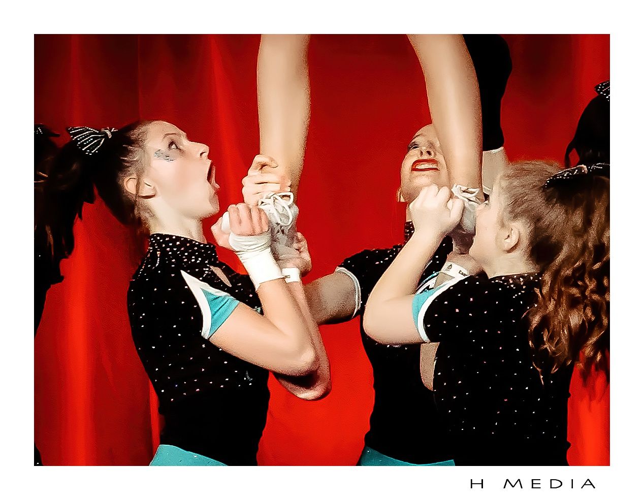 cheerleading sports event portrait capturing movement and expression during a performance