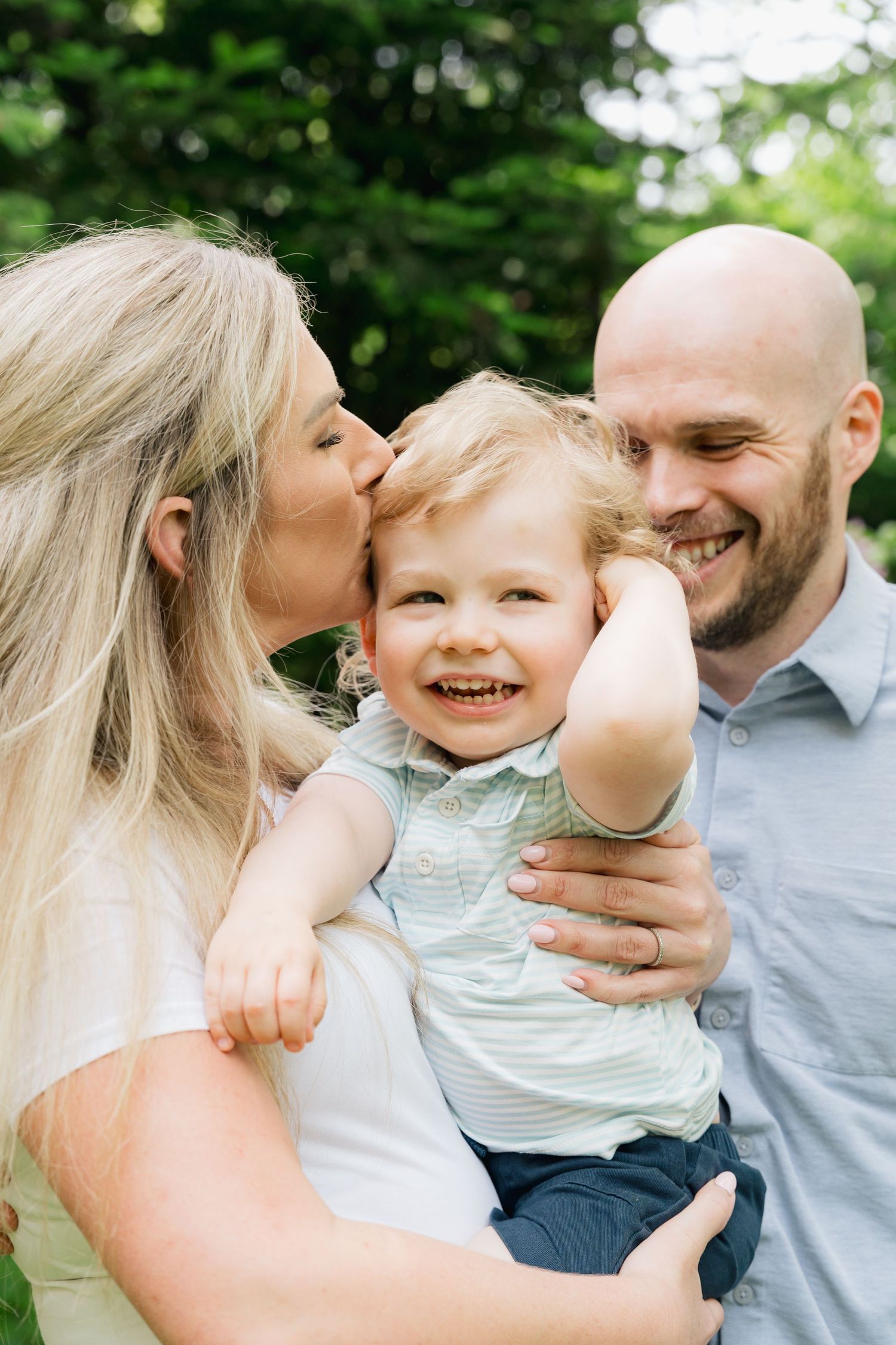 A joyful family moment captured in a series of candid outdoor photos showing playful interaction and laughter in Halifax, Nova Scotia.