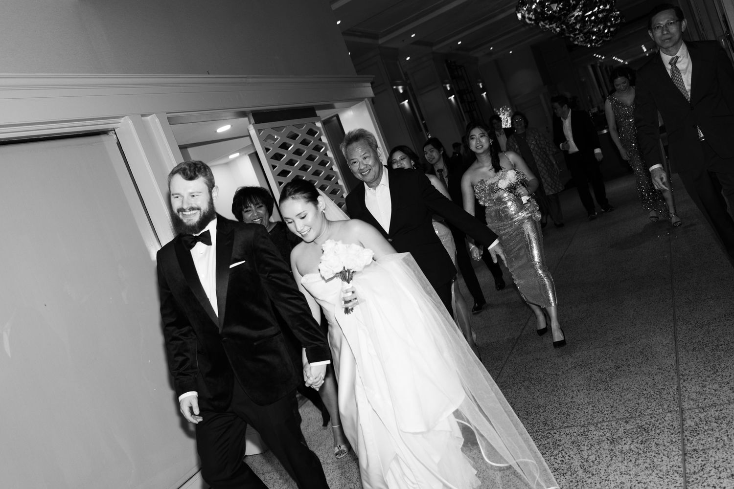 Black and white photo collage showing candid moments from a formal wedding reception celebration in Halifax, Nova Scotia.
