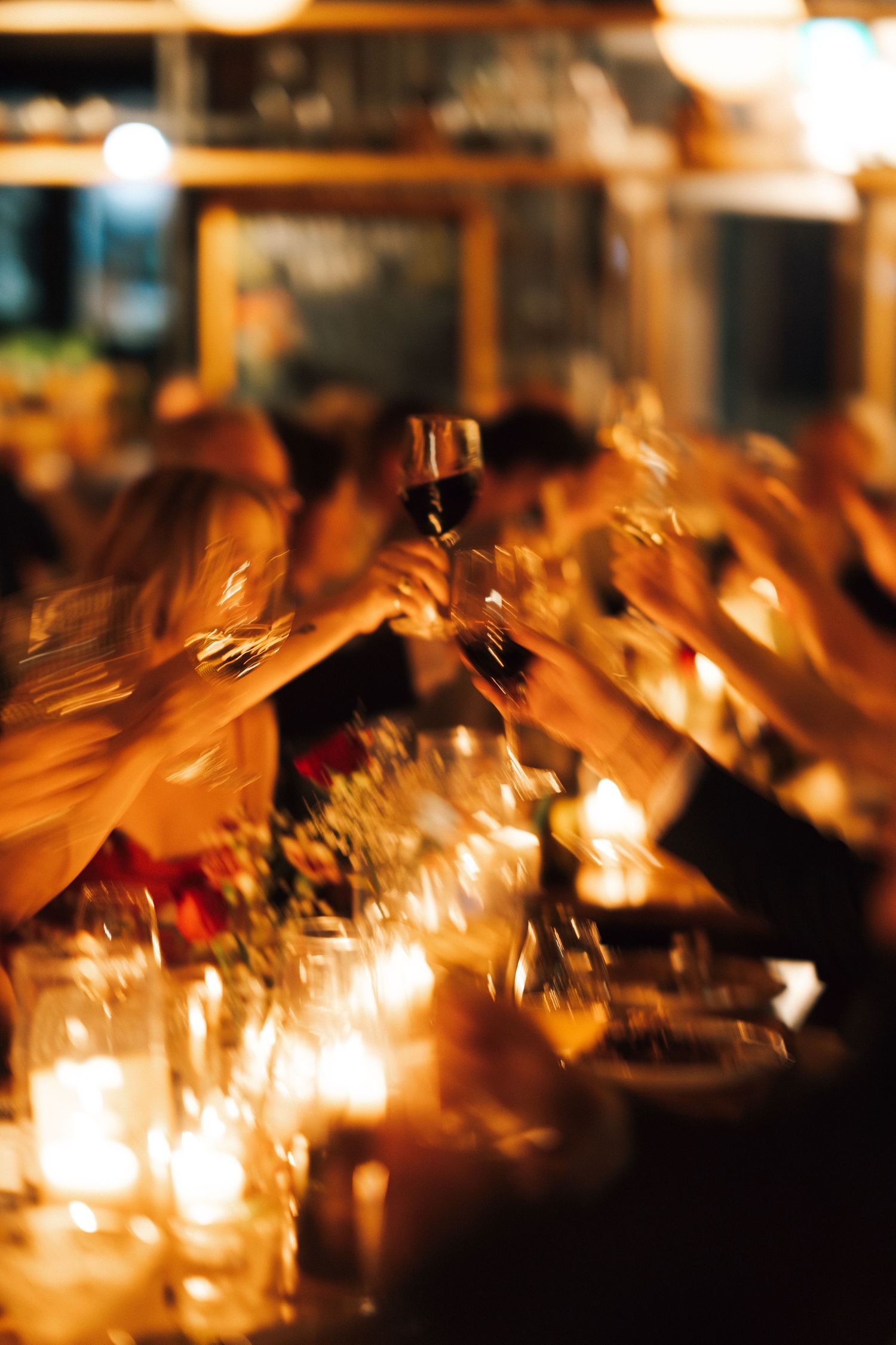 Candlelit dinner tables create a romantic ambiance at an evening reception in Halifax, Nova Scotia.