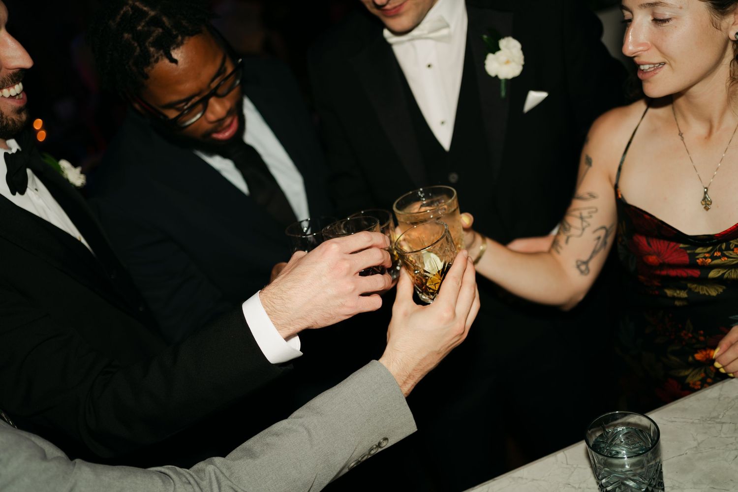 Wedding guests enjoying drinks and conversation at an elegant reception at Lord Nelson Hotel, Halifax, Nova Scotia.