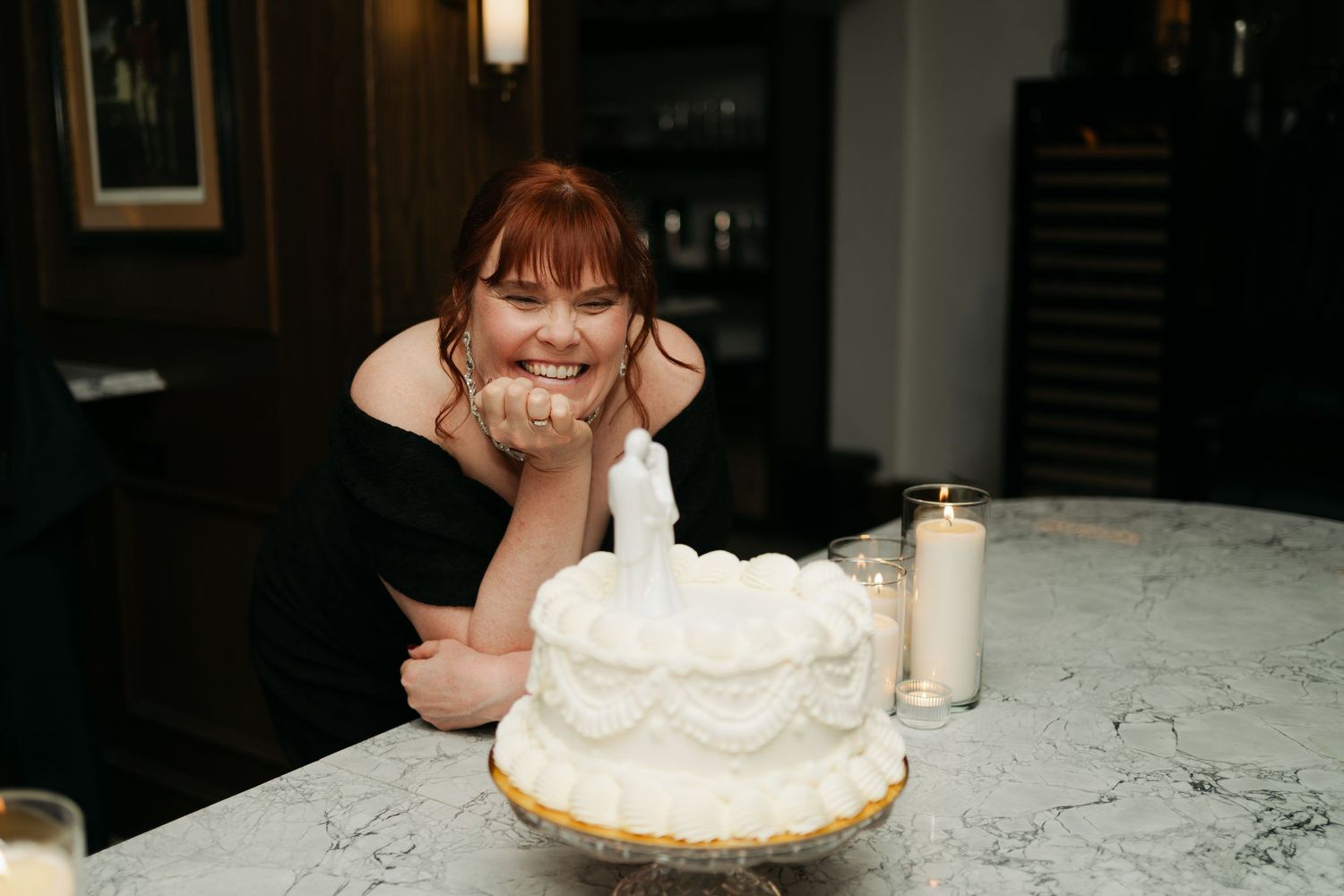 A slice of cream pie with whipped topping sits on a white marble countertop at Lord Nelson Hotel, Halifax, Nova Scotia.