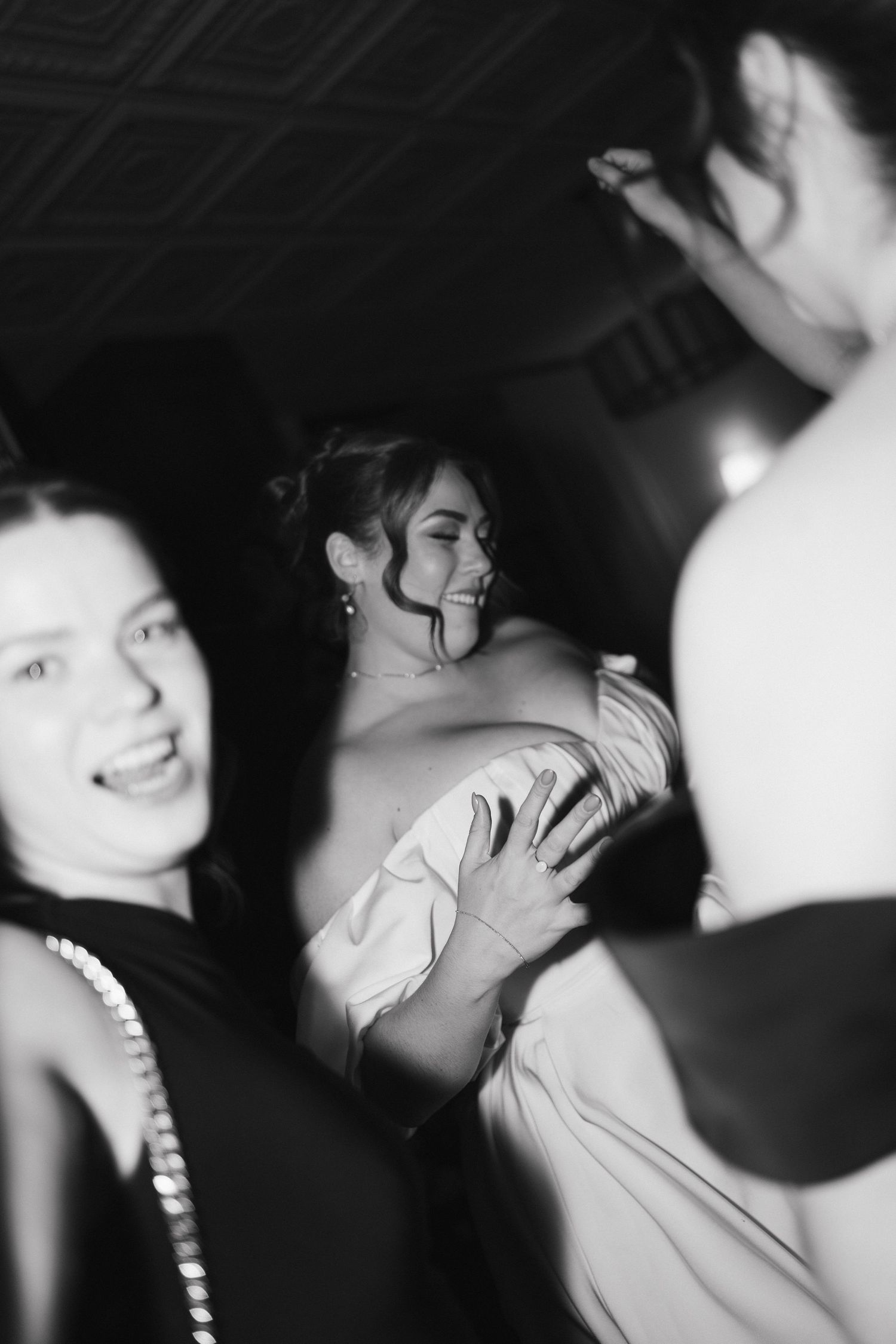 Black and white candid shots capture intimate moments during a wedding celebration at Lord Nelson Hotel, Halifax, Nova Scotia.