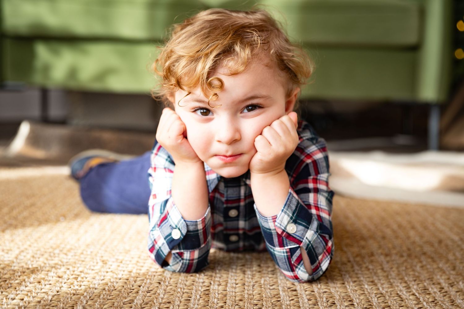 Series of playful poses on carpet showing various facial expressions.