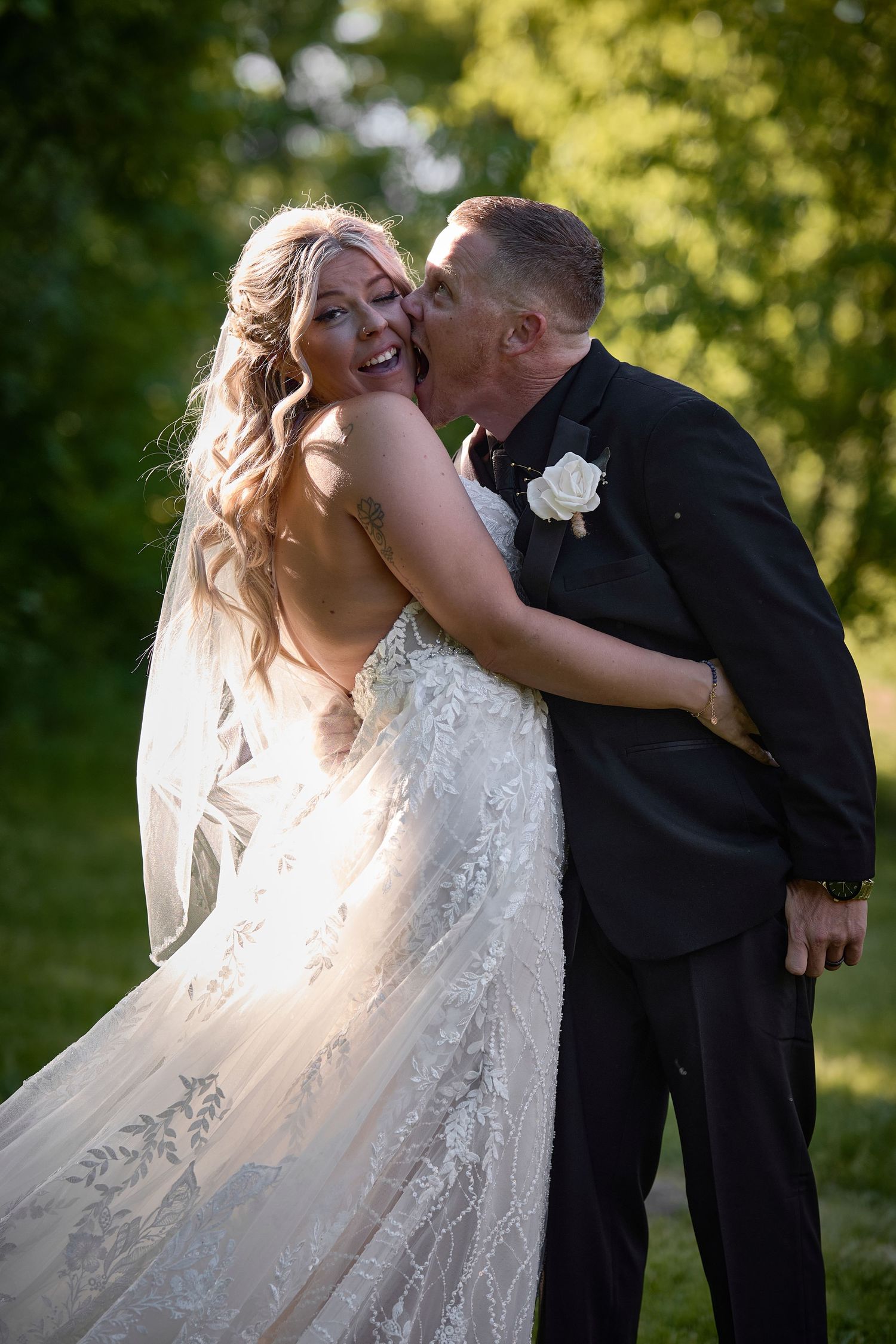 A romantic wedding moment captured in a series of photos showing a couple embracing in golden sunlight.