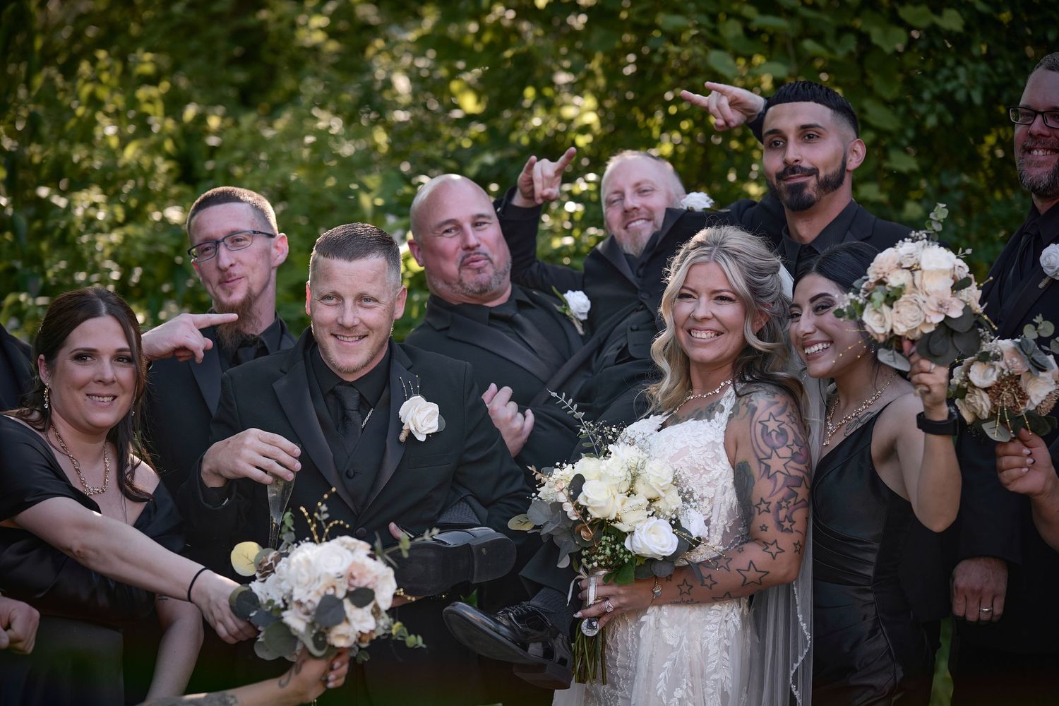 Wedding party group photos showing celebration and joy in an outdoor garden setting.