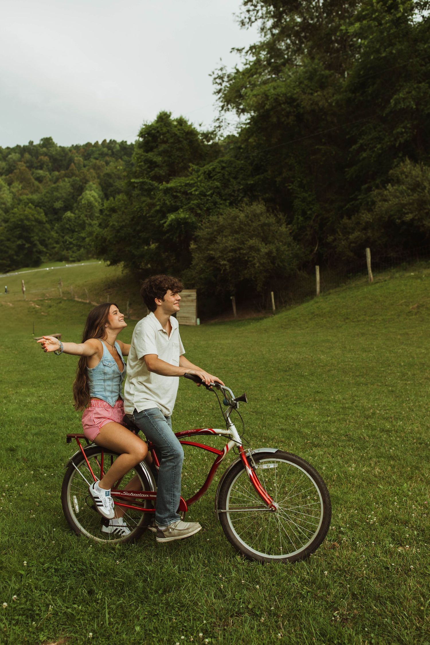Carefree bike ride through a green summer meadow.