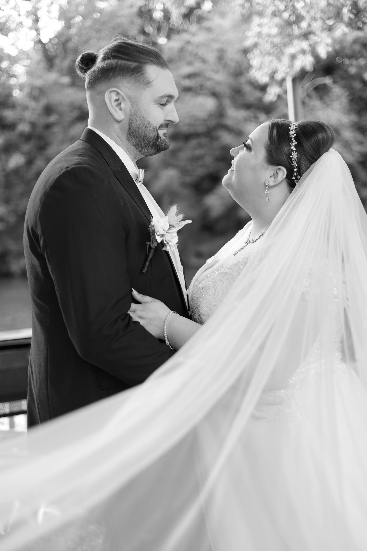 A sequence of romantic wedding ceremony moments showing moving interactions between a couple in black and white.