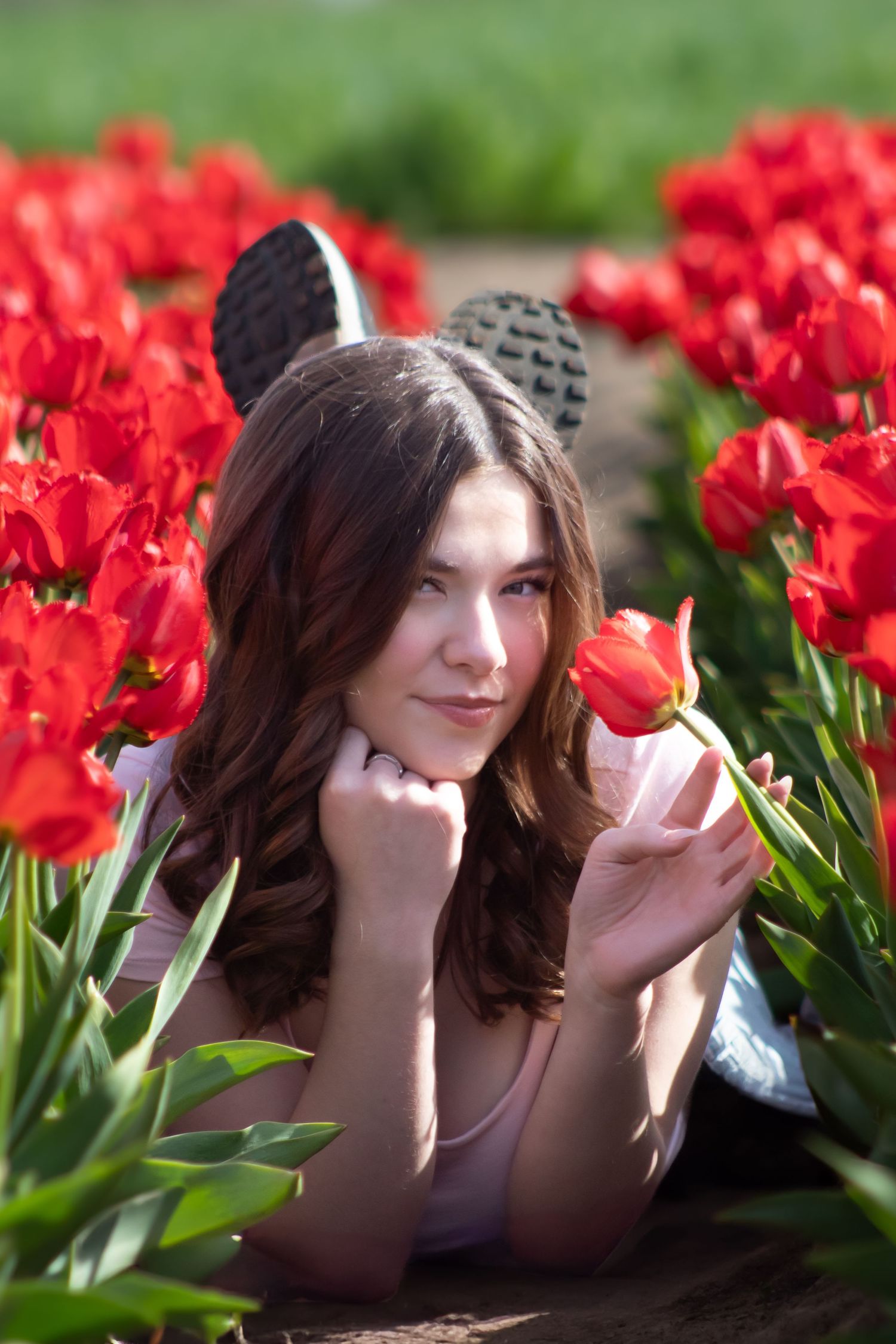 True to life image of a high school senior in tulips