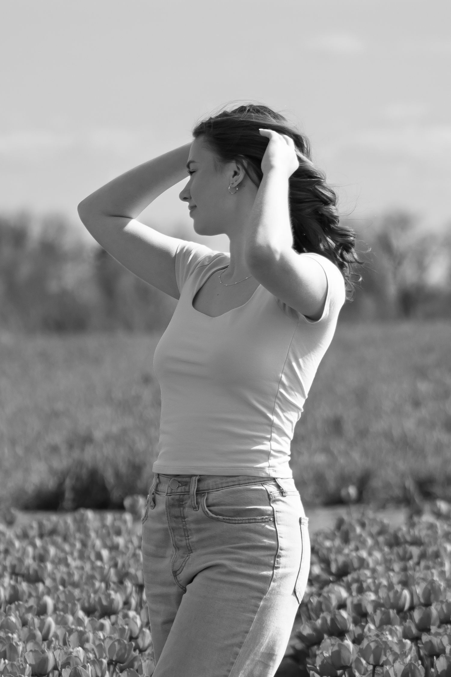 True to life image of a high school senior in tulips