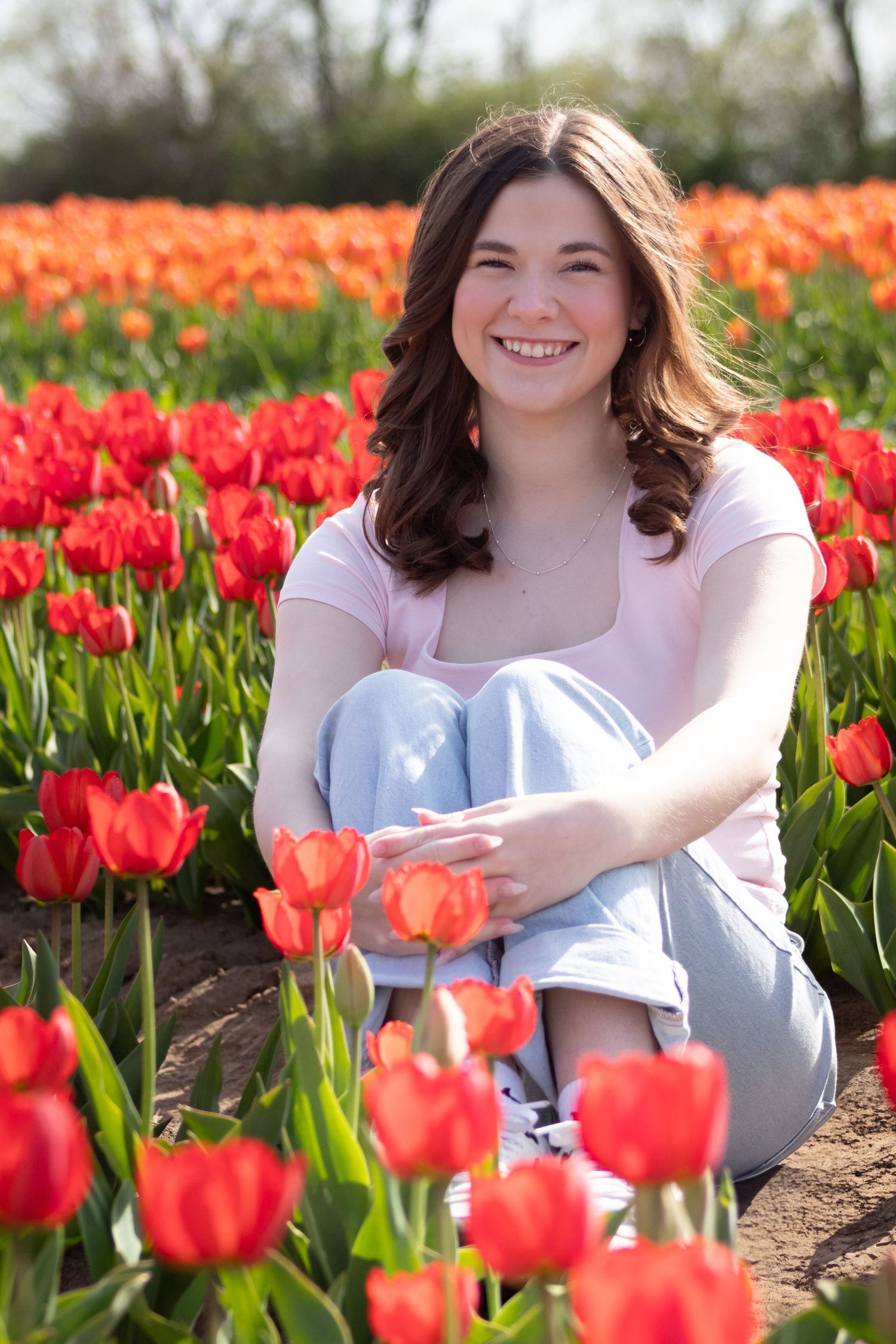 True to life image of a high school senior in tulips