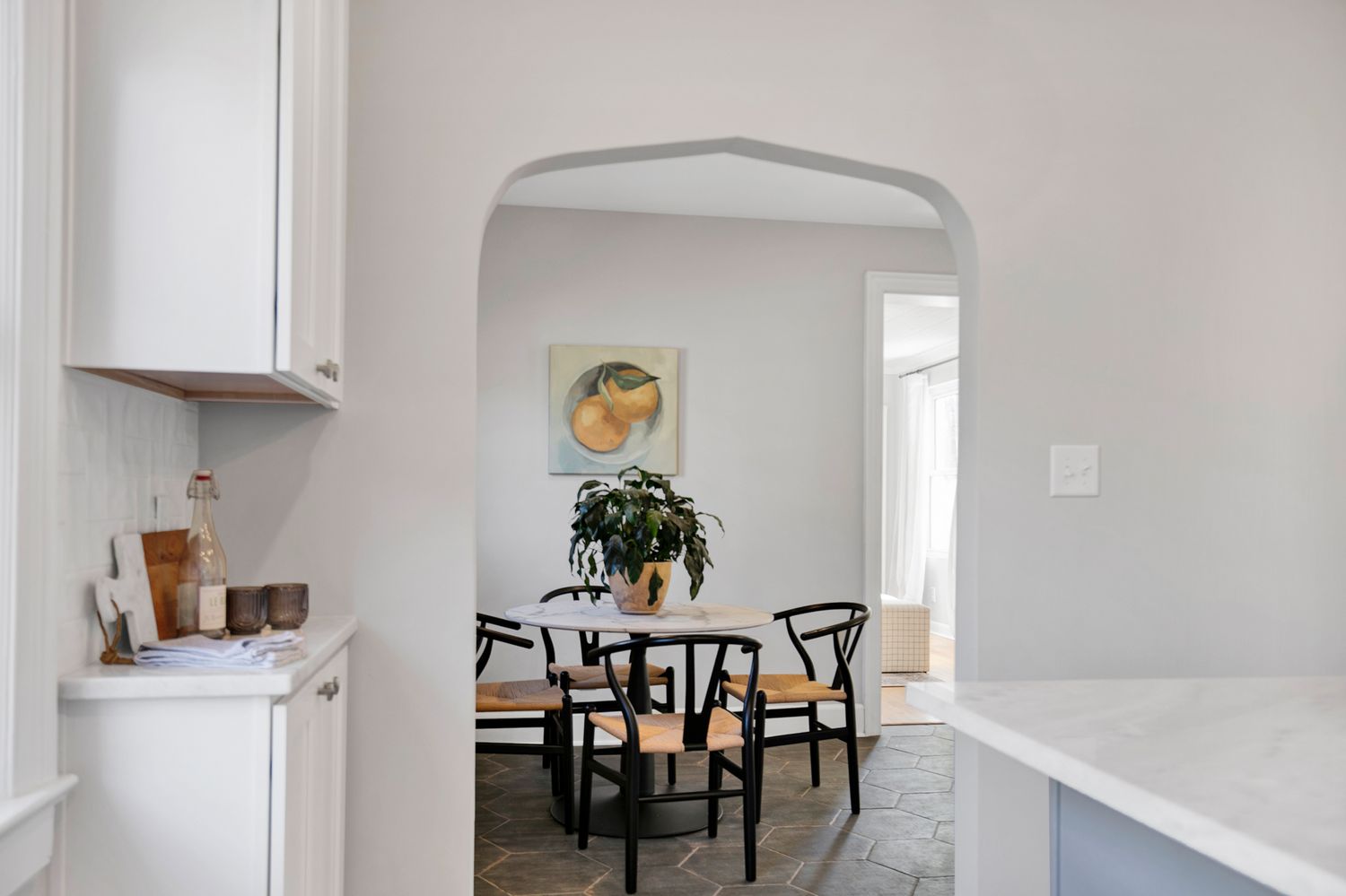 Open concept living space with clean lines and modern white finishes.