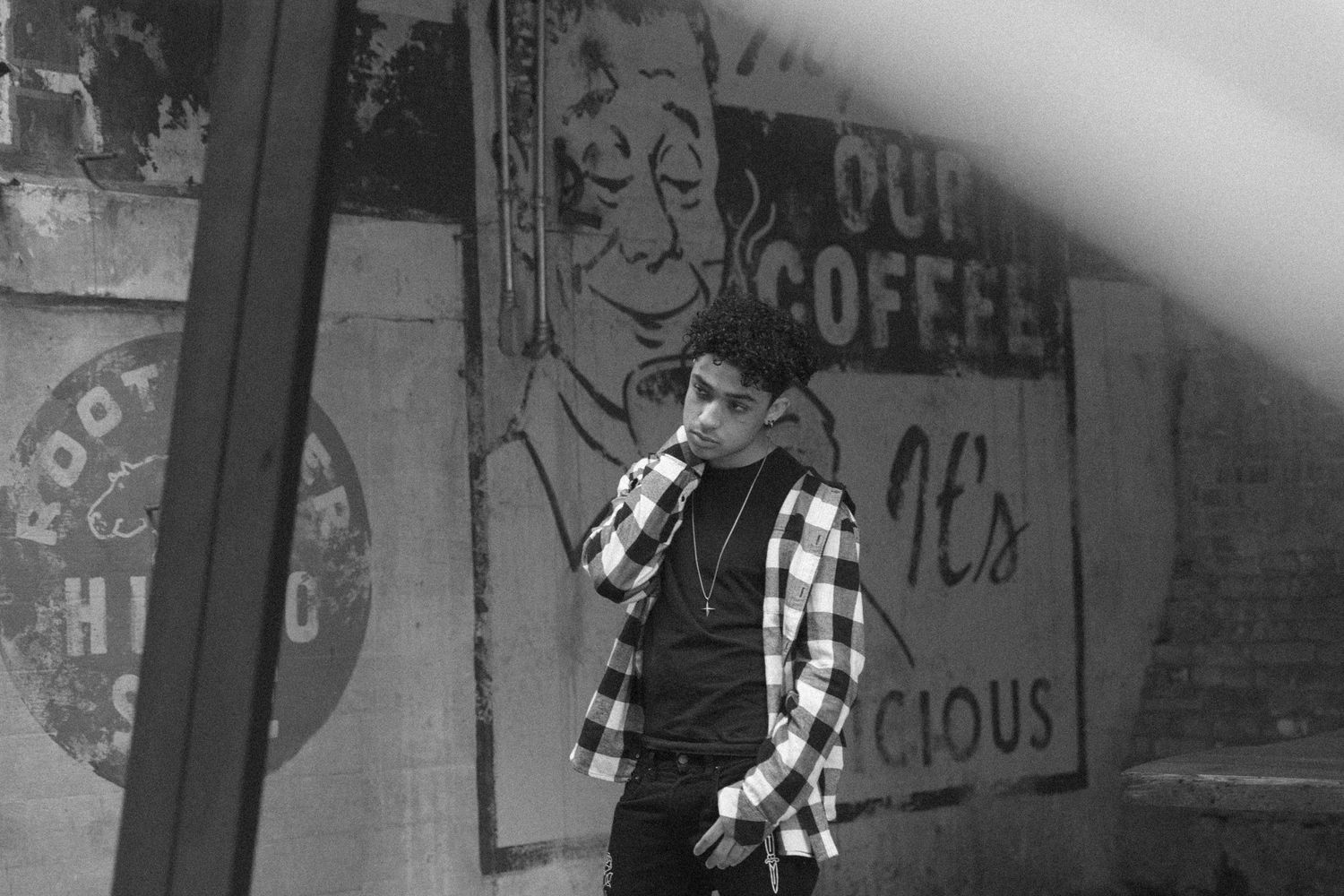 Black and white urban photography with graffiti and industrial elements.