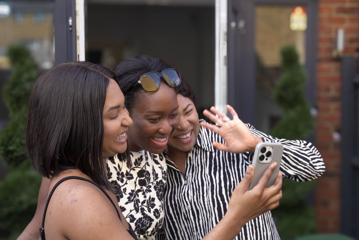 Picture of 3 ladies laughing.