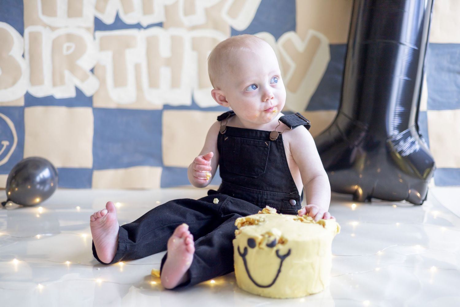 A series of four photos showing a toddler exploring near a yellow gift bag and blocks on the floor.
