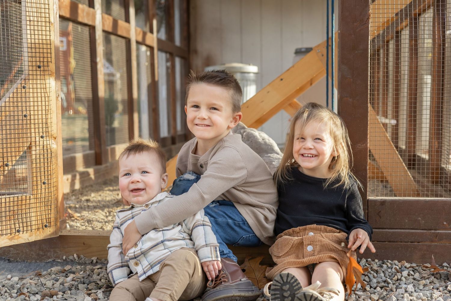 Series of candid lifestyle photos showing children playing and laughing in a rustic indoor setting.