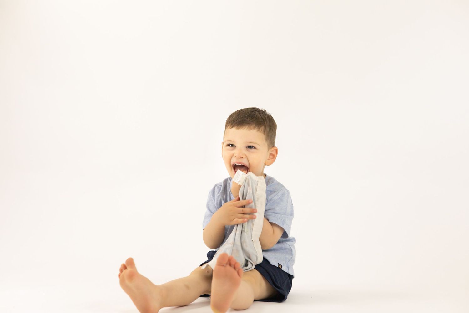 A series of baby crawling sequence photos showing a child's developmental movement progression on a white background.