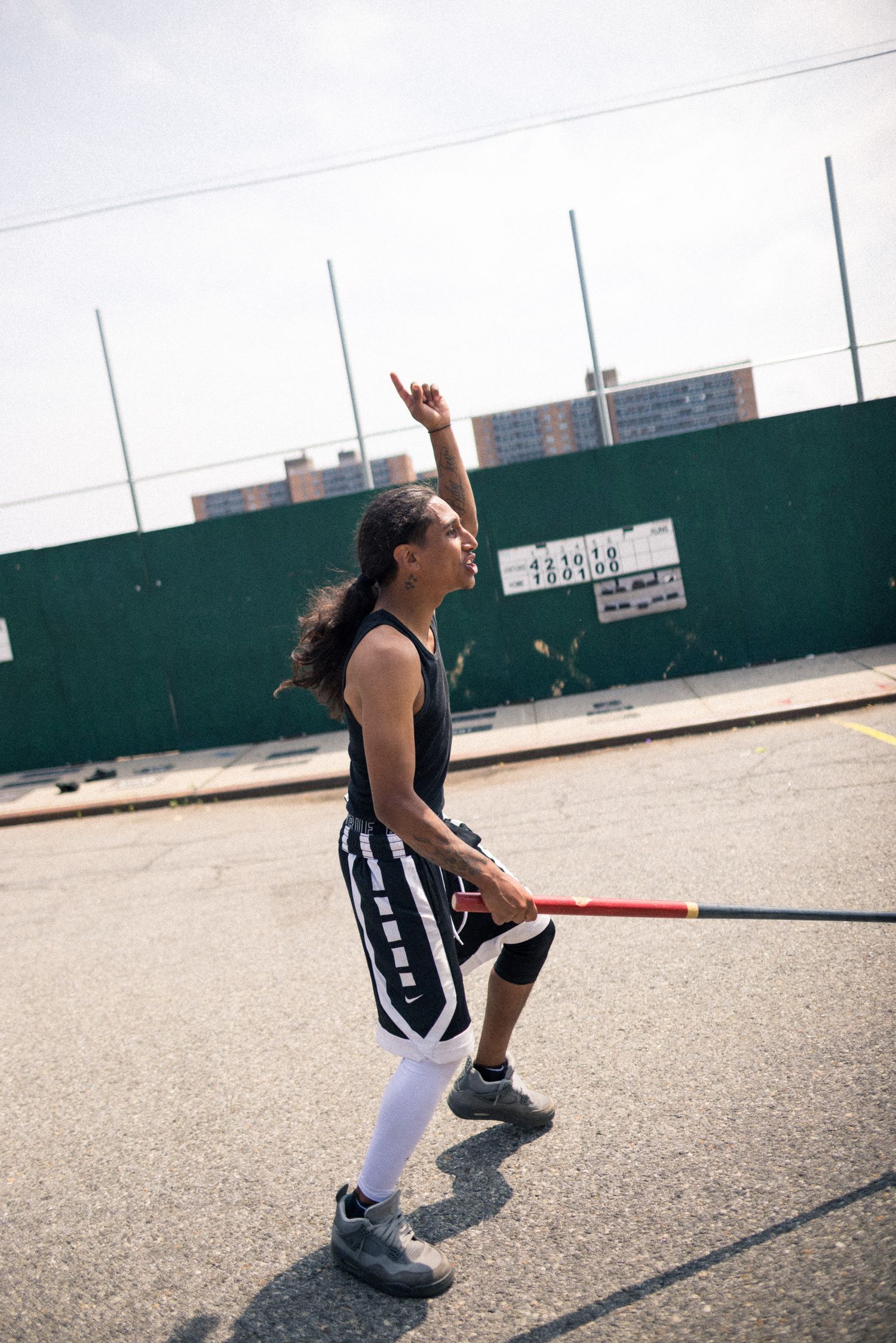 Three sequential photos showing a person in athletic wear practicing shooting form and follow-through on an outdoor court.