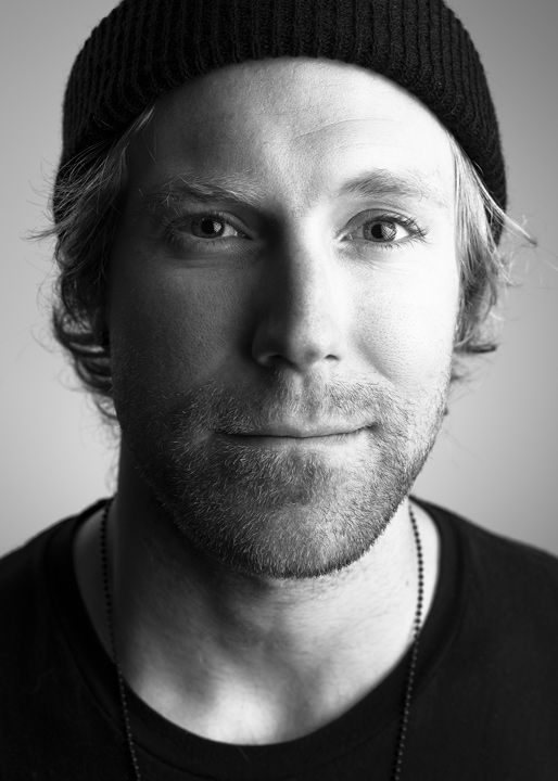 Portrait series in black and white showing different expressions with winter hat.