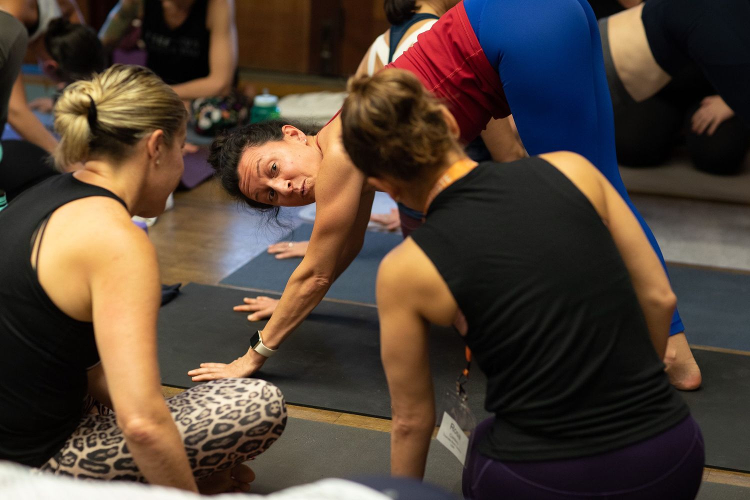 Students interact during a group exercise workshop session.