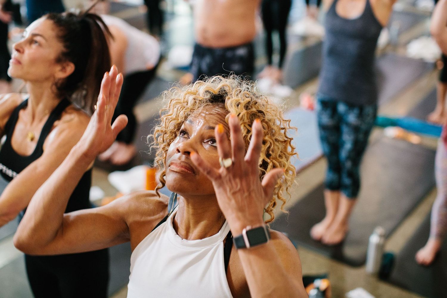 Group participating in an energetic dance or exercise class.