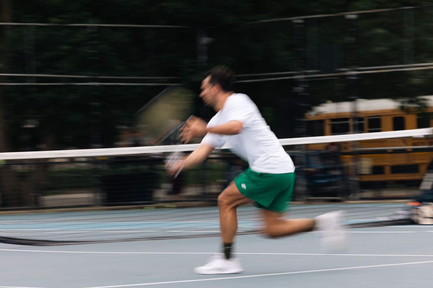 A sequence of six motion blur photographs shows the progression of someone running on a track in athletic wear.
